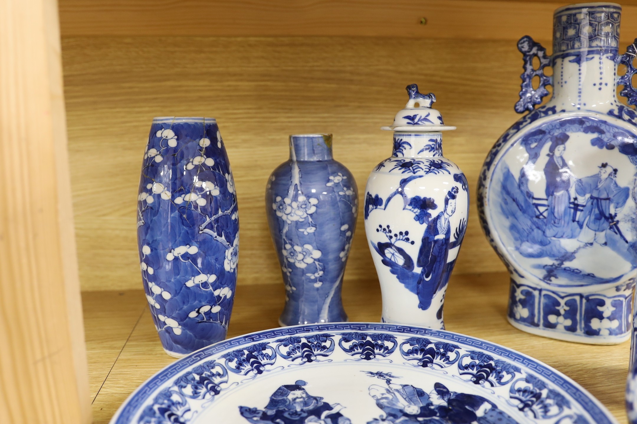 A collection of mixed 19th century Chinese blue and white porcelain to include a dish decorated with characters, other blue and white wares (some with damage). 29.5cm tall